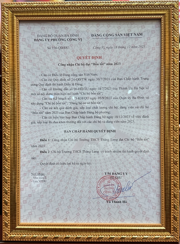 A framed certificate with a stamp

Description automatically generated